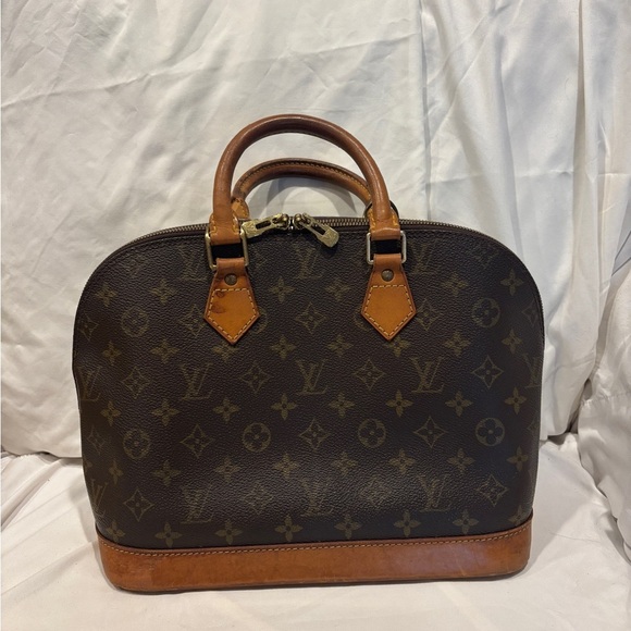 Louis Vuitton Alma Monogram Coated Canvas Handbag - Picture 3 of 16